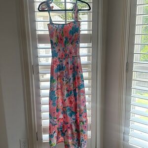 sweet pea smocked floral dress in size small